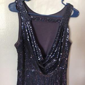 Blue sequin covered dress.